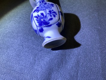 Five Chinese mostly blue and white vases, Kangxi